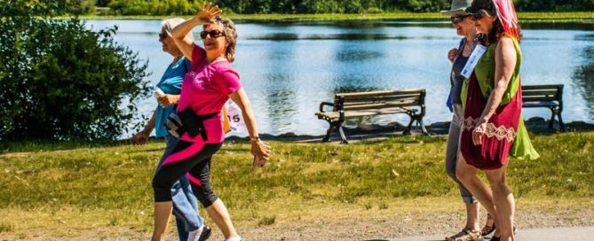 women walking in a park