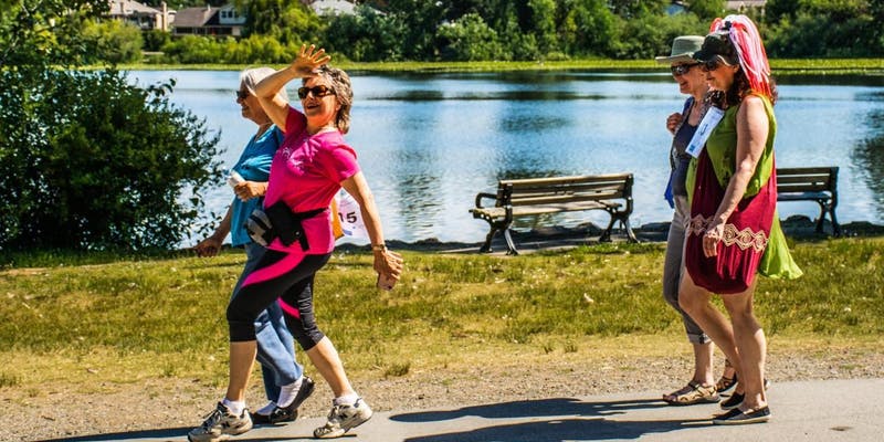 women walking in a park