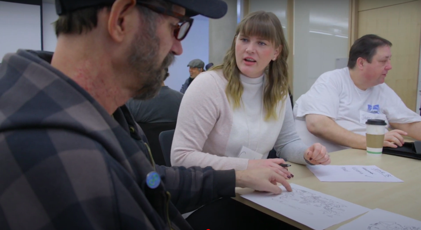 people talking at a table