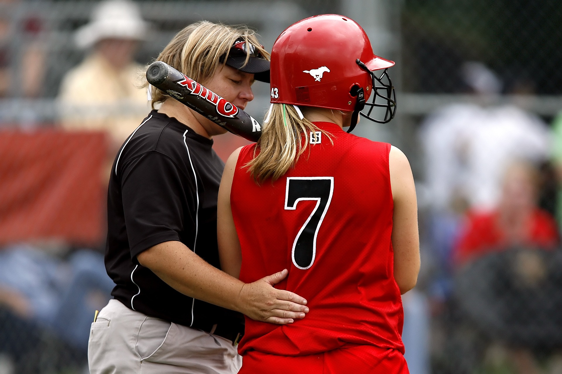 girl playing softball